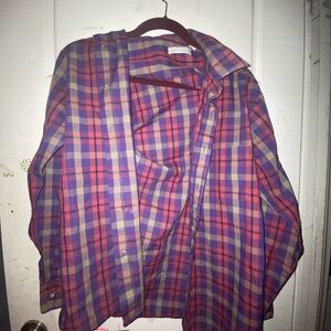 Women’s button down plaid shirt.